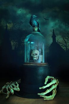 Creepy glass bell jar with crow and skeleton hands