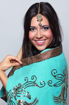 young pretty woman in indian turquoise sari