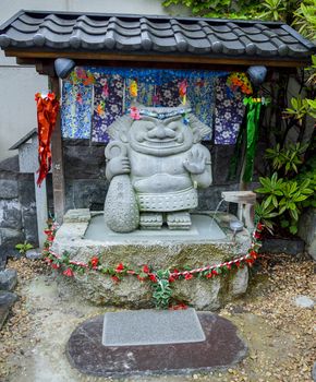Small shrine with little giant stone