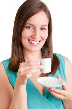 Young woman drinking a hot coffee from a white cup, isolated in white