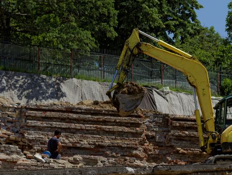 the excavator working on a construction site