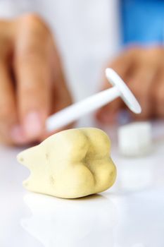 dentist holding dental Mirror, dental hygiene concept