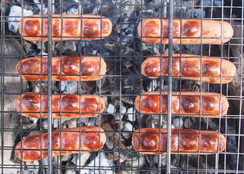 sausages on the fire
