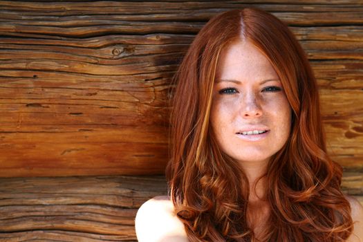 Portrait of the beautiful red-haired girl
