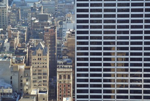 Big building against smaller ones