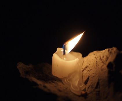 candle on the stone 