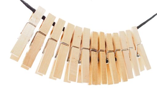 Clothespins and rope on a white background 