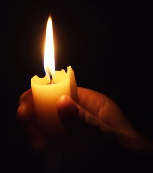 hand with candle