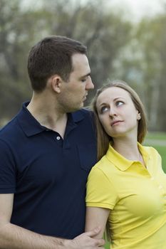 Portrait of love couple embracing outdoor