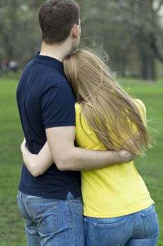 Portrait of love couple embracing outdoor