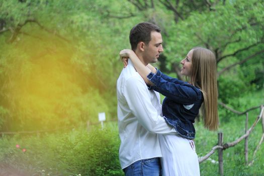 Portrait of love couple embracing outdoor