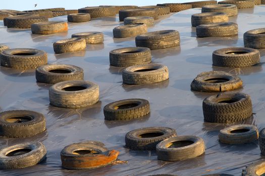 the old tires scattered on the ground