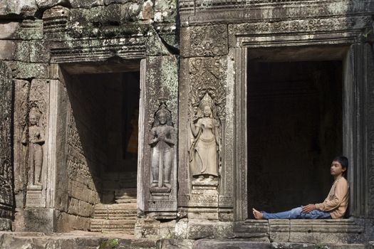 Angkor Thom temple ruins at Angkor Wat in Camboda.