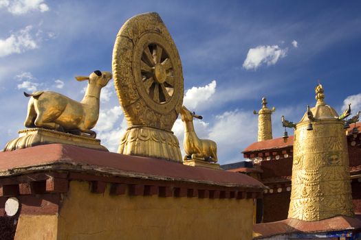Lhasa - Tibet Autonomous Region of China. Buddhist Mandala on the golden roof tops of the  Jokhang Temple, also called the Qokang Monastery or Zuglagkang. It is located on Barkhor Square in Lhasa. For most Tibetans it is the most sacred and important temple in Tibet.