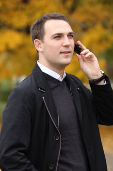 Portrait of young attractive man, outdoors