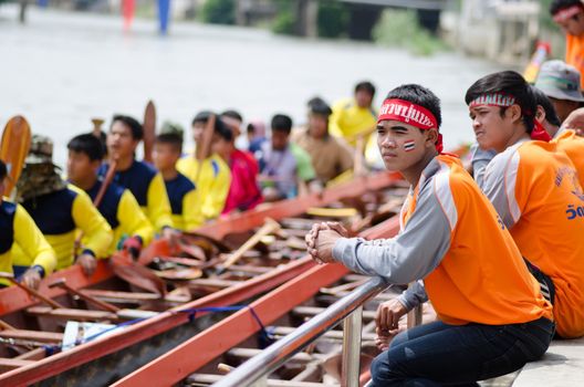 Petchaburi, THAILAND - October 7 : Participants in the Petchaburi Long Boat Competition 2012 on October 7, 2012 in The Petchaburi river ,Petchaburi Province, Thailand. 