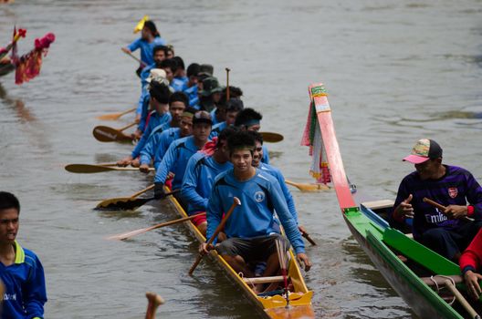 Petchaburi, THAILAND - October 7 : Participants in the Petchaburi Long Boat Competition 2012 on October 7, 2012 in The Petchaburi river ,Petchaburi Province, Thailand. 