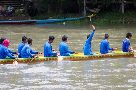 Petchaburi, THAILAND - October 7 : Participants in the Petchaburi Long Boat Competition 2012 on October 7, 2012 in The Petchaburi river ,Petchaburi Province, Thailand. 