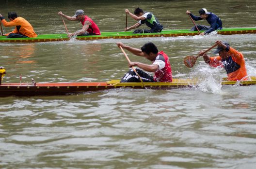 Petchaburi, THAILAND - October 7 : Participants in the Petchaburi Long Boat Competition 2012 on October 7, 2012 in The Petchaburi river ,Petchaburi Province, Thailand. 