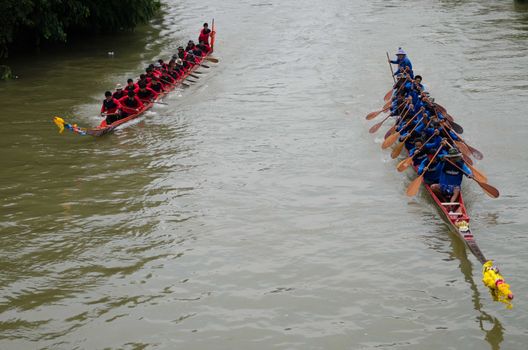 Petchaburi, THAILAND - October 7 : Participants in the Petchaburi Long Boat Competition 2012 on October 7, 2012 in The Petchaburi river ,Petchaburi Province, Thailand. 