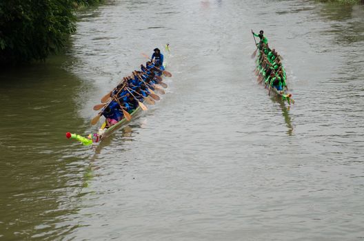 Petchaburi, THAILAND - October 7 : Participants in the Petchaburi Long Boat Competition 2012 on October 7, 2012 in The Petchaburi river ,Petchaburi Province, Thailand. 