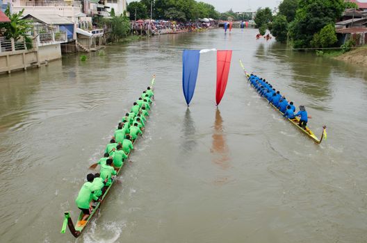 Petchaburi, THAILAND - October 7 : Participants in the Petchaburi Long Boat Competition 2012 on October 7, 2012 in The Petchaburi river ,Petchaburi Province, Thailand. 