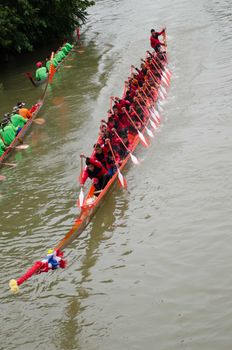 Petchaburi, THAILAND - October 7 : Participants in the Petchaburi Long Boat Competition 2012 on October 7, 2012 in The Petchaburi river ,Petchaburi Province, Thailand. 