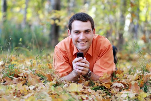 Portrait of young attractive man, outdoors