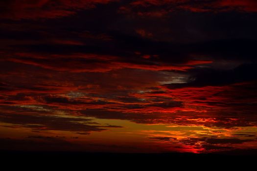 Sunset sky with dark clouds