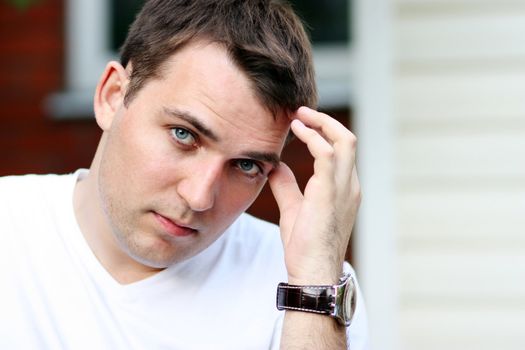 Portrait of young attractive man, outdoors