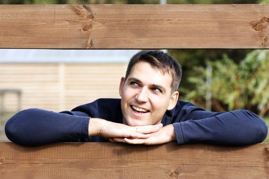 Portrait of young attractive man, outdoors