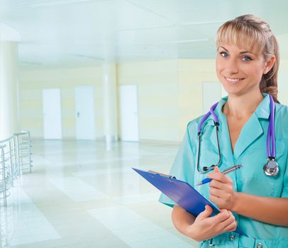 a female doctor holding clipboard