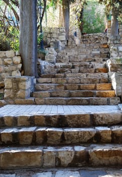 Old stone stairs leading up. Rosh Pinna, Israel.