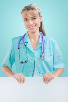 female doctor presenting empty board