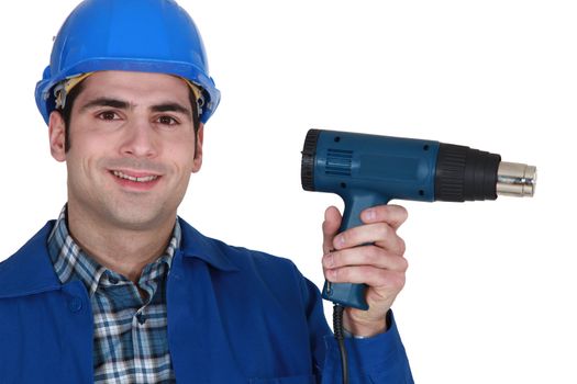 male worker and an electric screwdriver