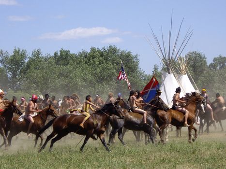 Young American Indians bareback riding