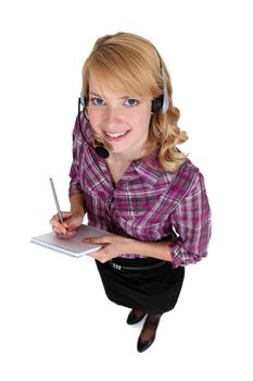 A blond woman with a headset on.