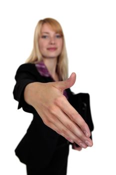 young businesswoman shaking hands with someone