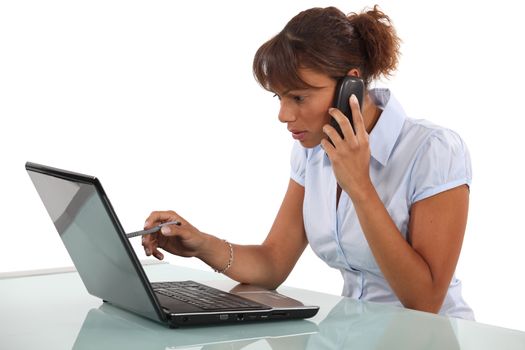 Woman telephoning technical help desk