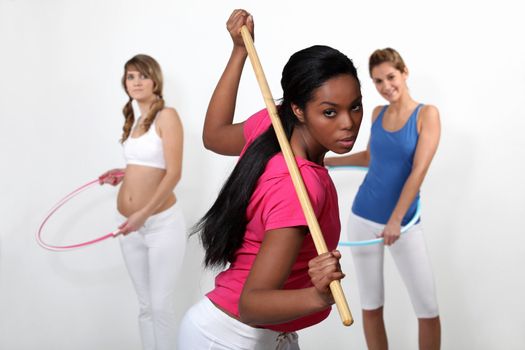 Young women doing aerobics exercises