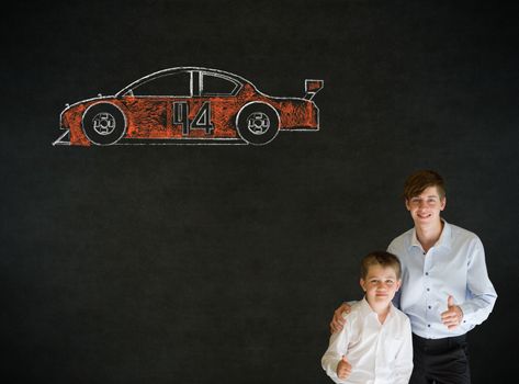 Thumbs up boy dressed up as business man with teacher man and Nascar racing fan car on blackboard background