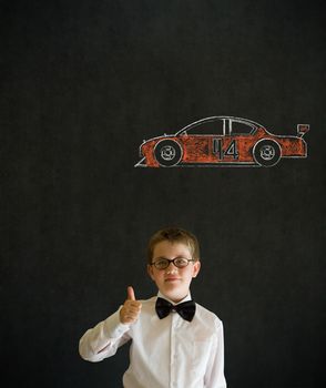 Thumbs up boy dressed up as business man with Nascar racing fan car on blackboard background