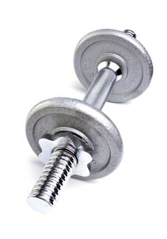 Dumbell weights on white background