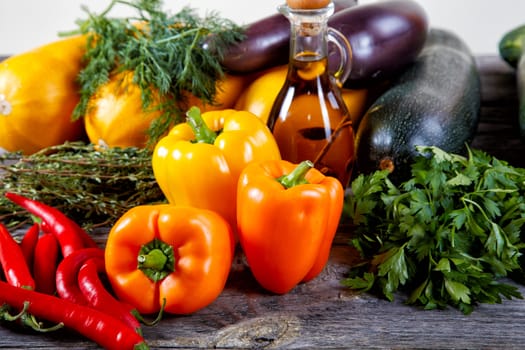 Still-life from vegetables on an old table