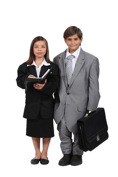 Little kids dressed as business people