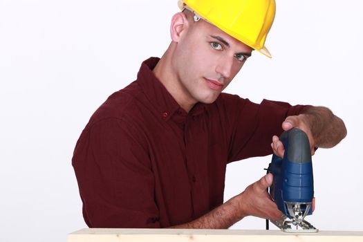 Man sawing wood