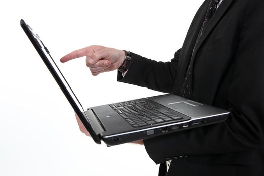 Man pointing at laptop screen