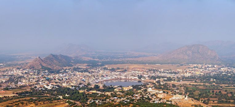 Panorama Holy city Pushkar and Puchkar Mela (camel fair) aerial view from Savitri temple. Rajasthan, India