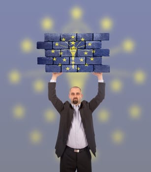 Businessman holding a large piece of a brick wall, flag of Indiana, isolated on national flag