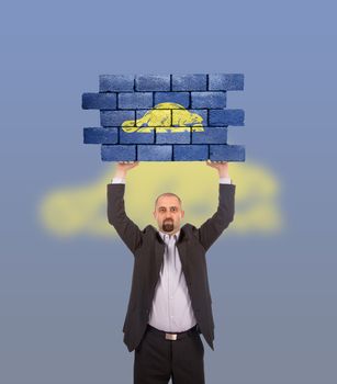 Businessman holding a large piece of a brick wall, flag of Oregon, isolated on national flag